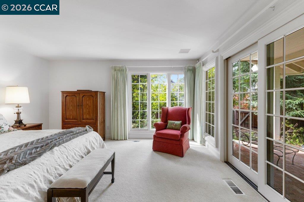 2255 Alameda Diablo Diablo, CA 94528 - Photo 22 of 49 a bedroom with furniture and a large window