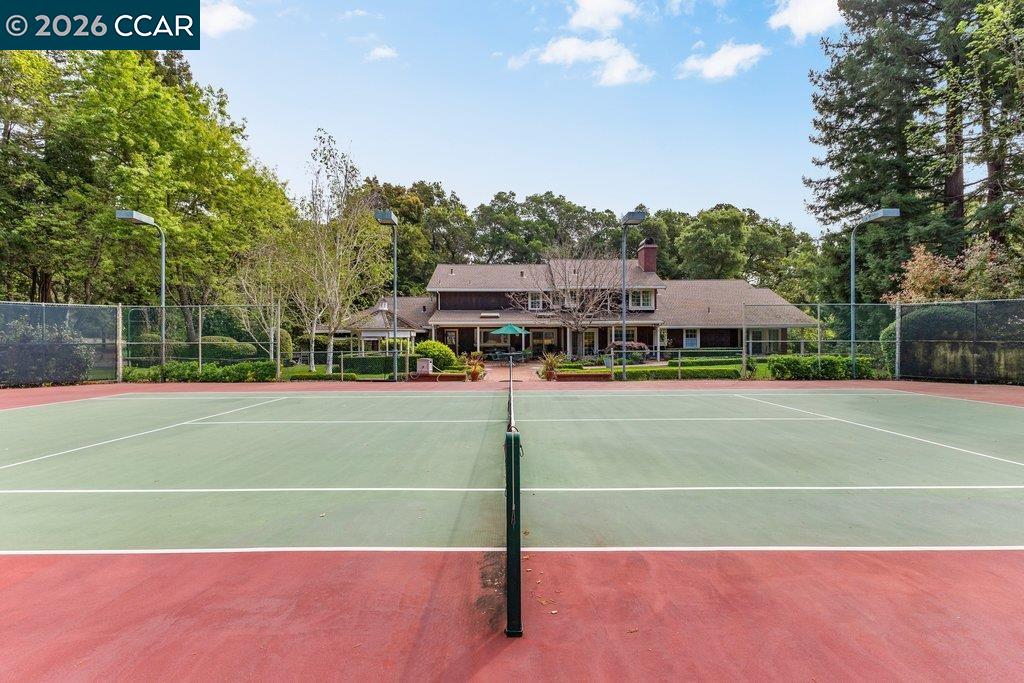 2255 Alameda Diablo Diablo, CA 94528 - Photo 40 of 49 a view of a tennis ground with large trees