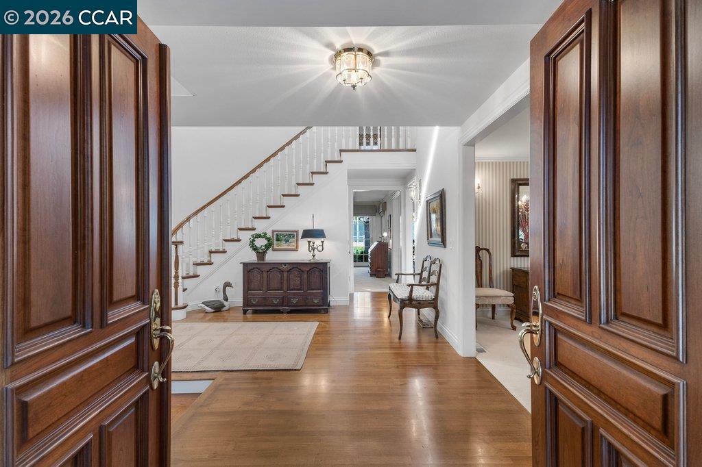 2255 Alameda Diablo Diablo, CA 94528 - Photo 5 of 49 a view of entryway and hall with wooden floor