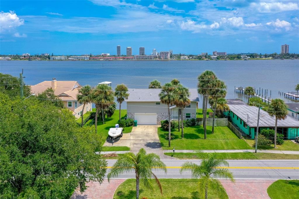 a view of a lake with a garden