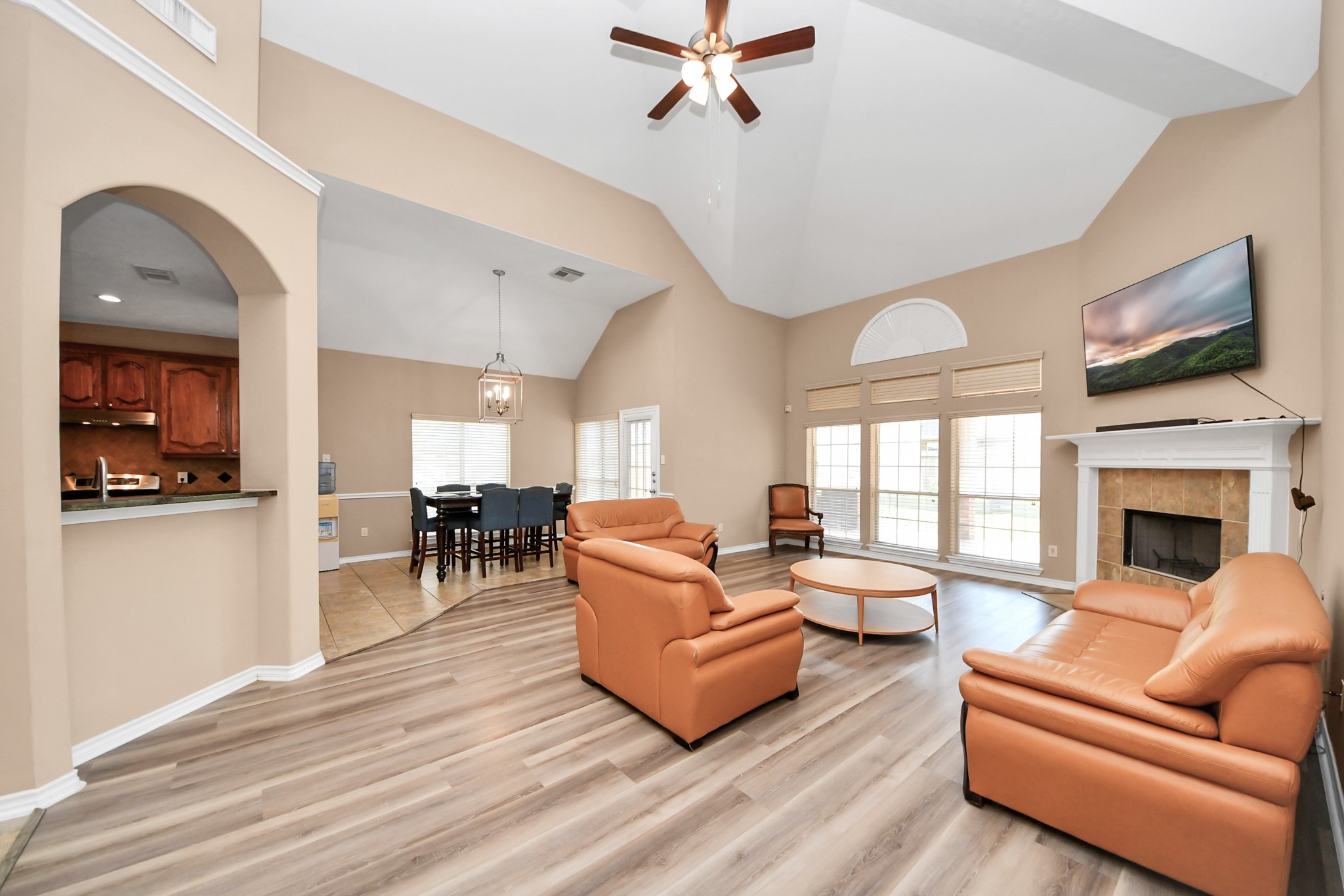 706 River Delta Lane Rosenberg, TX 77469 - Photo 20 of 50 a living room with fireplace furniture and a flat screen tv