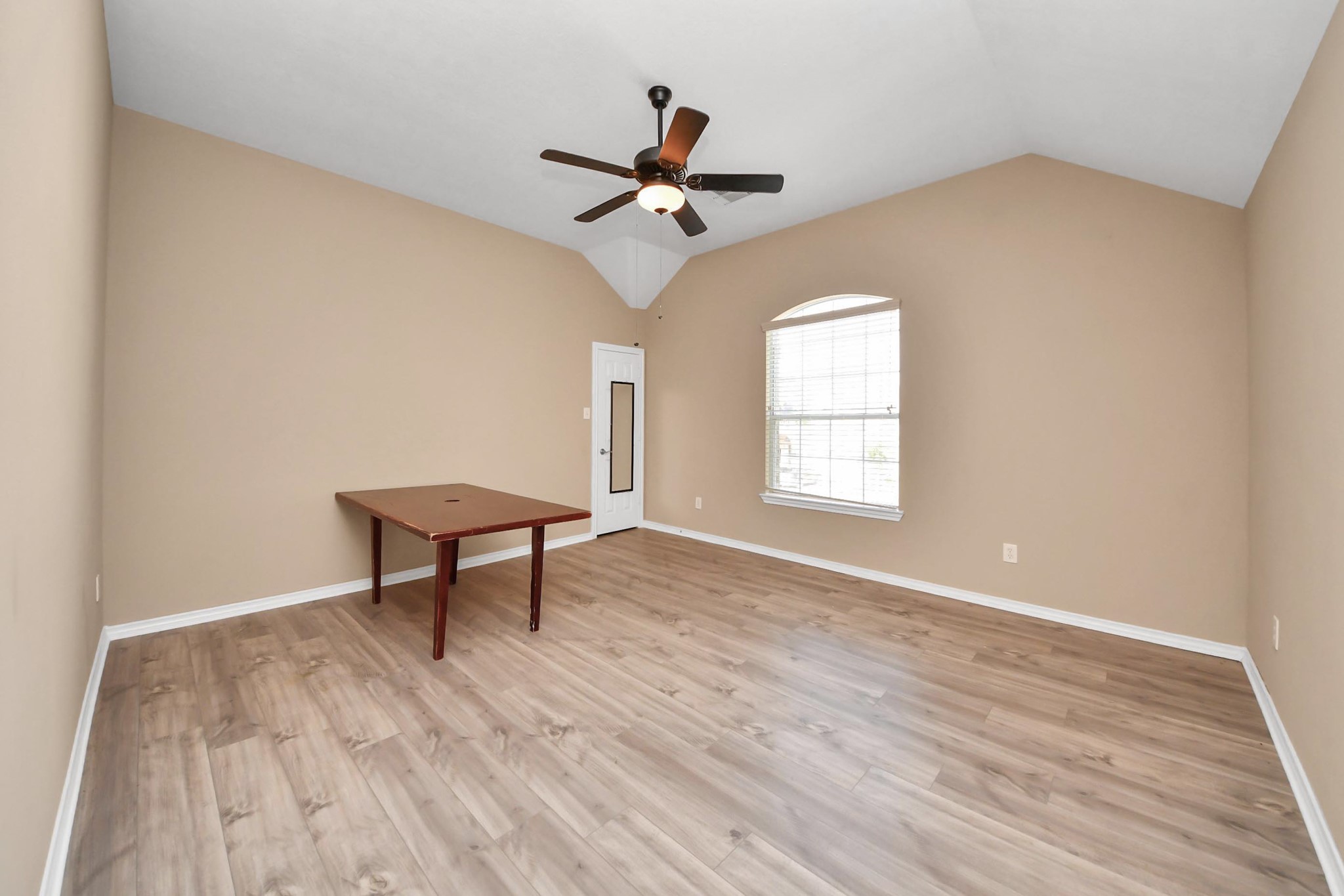706 River Delta Lane Rosenberg, TX 77469 - Photo 36 of 50 a view of a room with wooden floor and a ceiling fan
