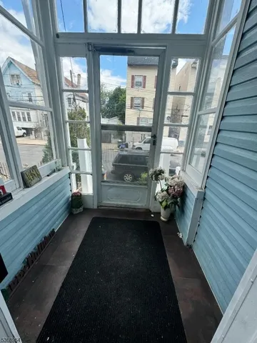 a view of a balcony with chair