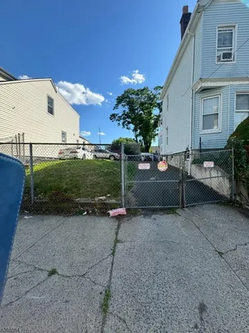a view of a couches under an umbrella