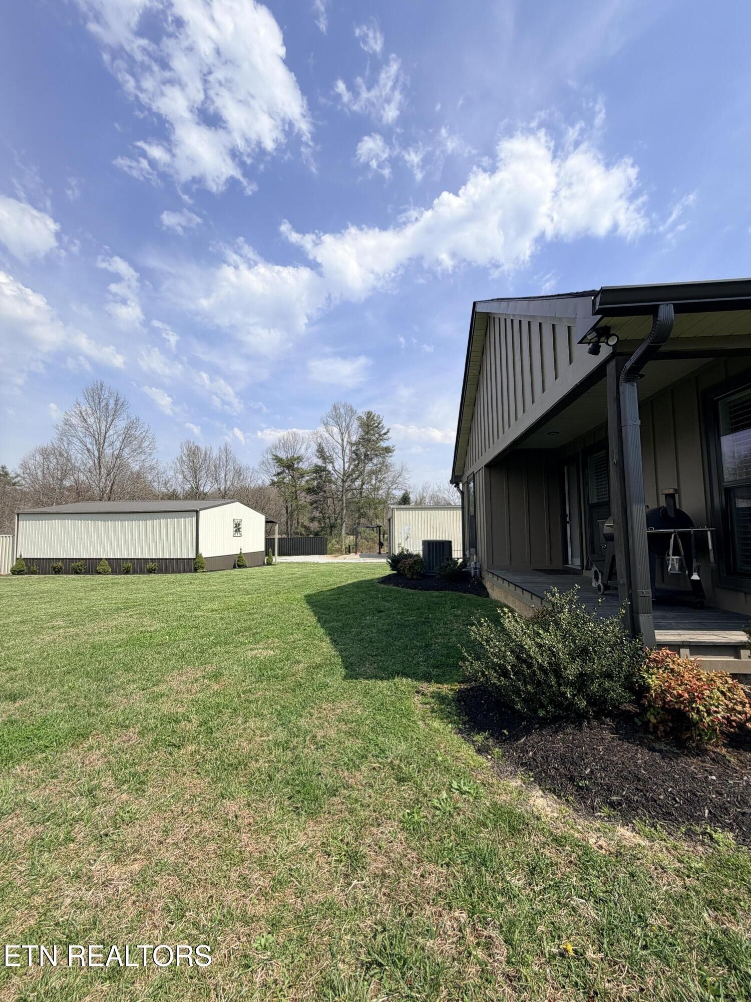 1021 Pleasant Grove Road Winfield, TN 37892 - Photo 14 of 42 a view of a house with backyard and garden