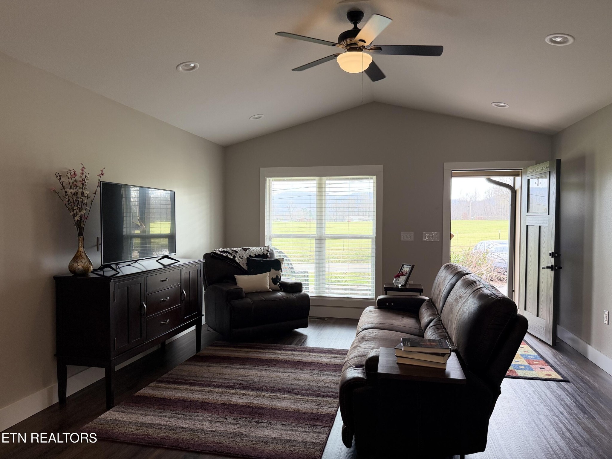 1021 Pleasant Grove Road Winfield, TN 37892 - Photo 20 of 42 a living room with furniture and a flat screen tv