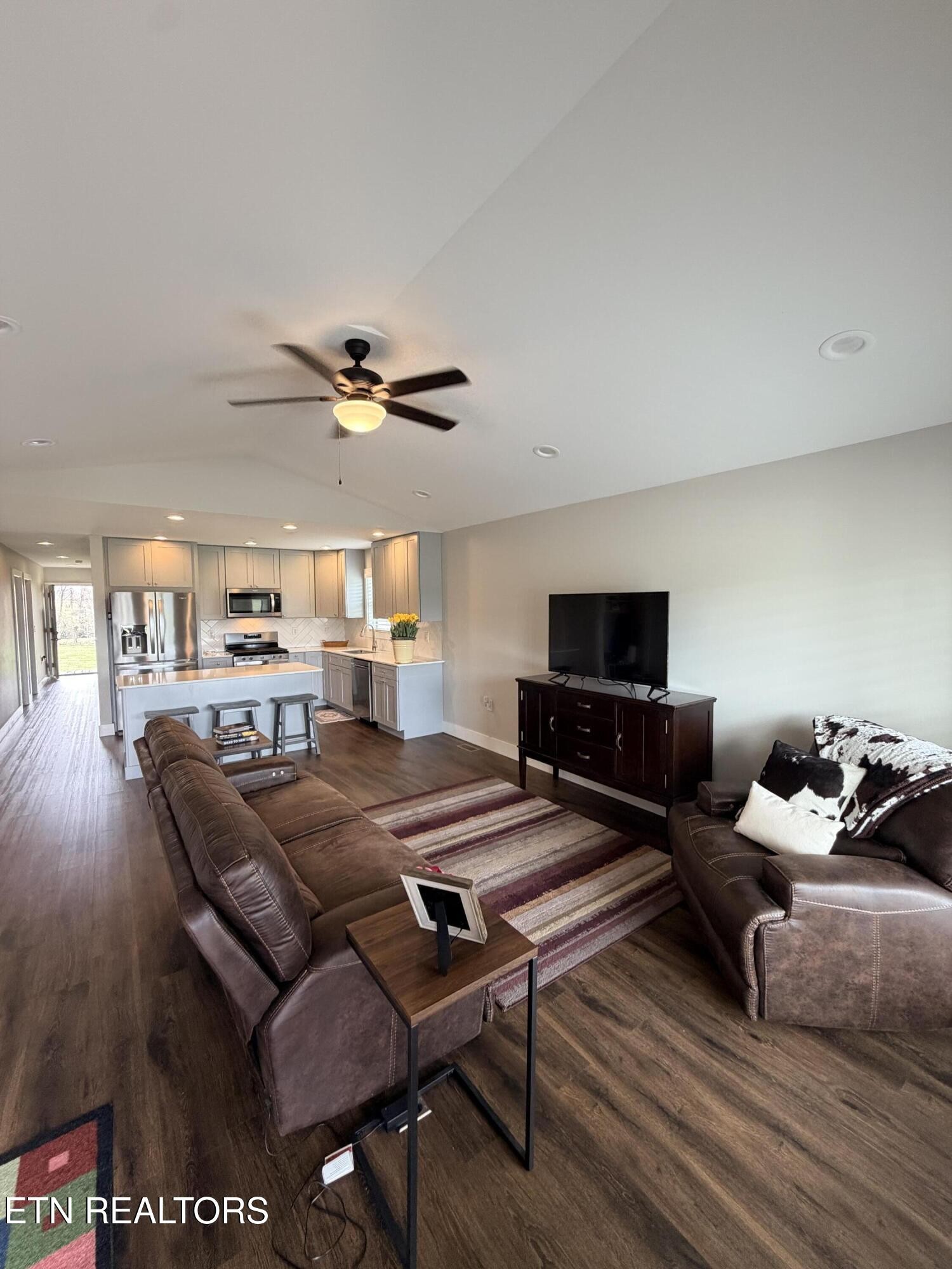 1021 Pleasant Grove Road Winfield, TN 37892 - Photo 22 of 42 a living room with furniture and a flat screen tv