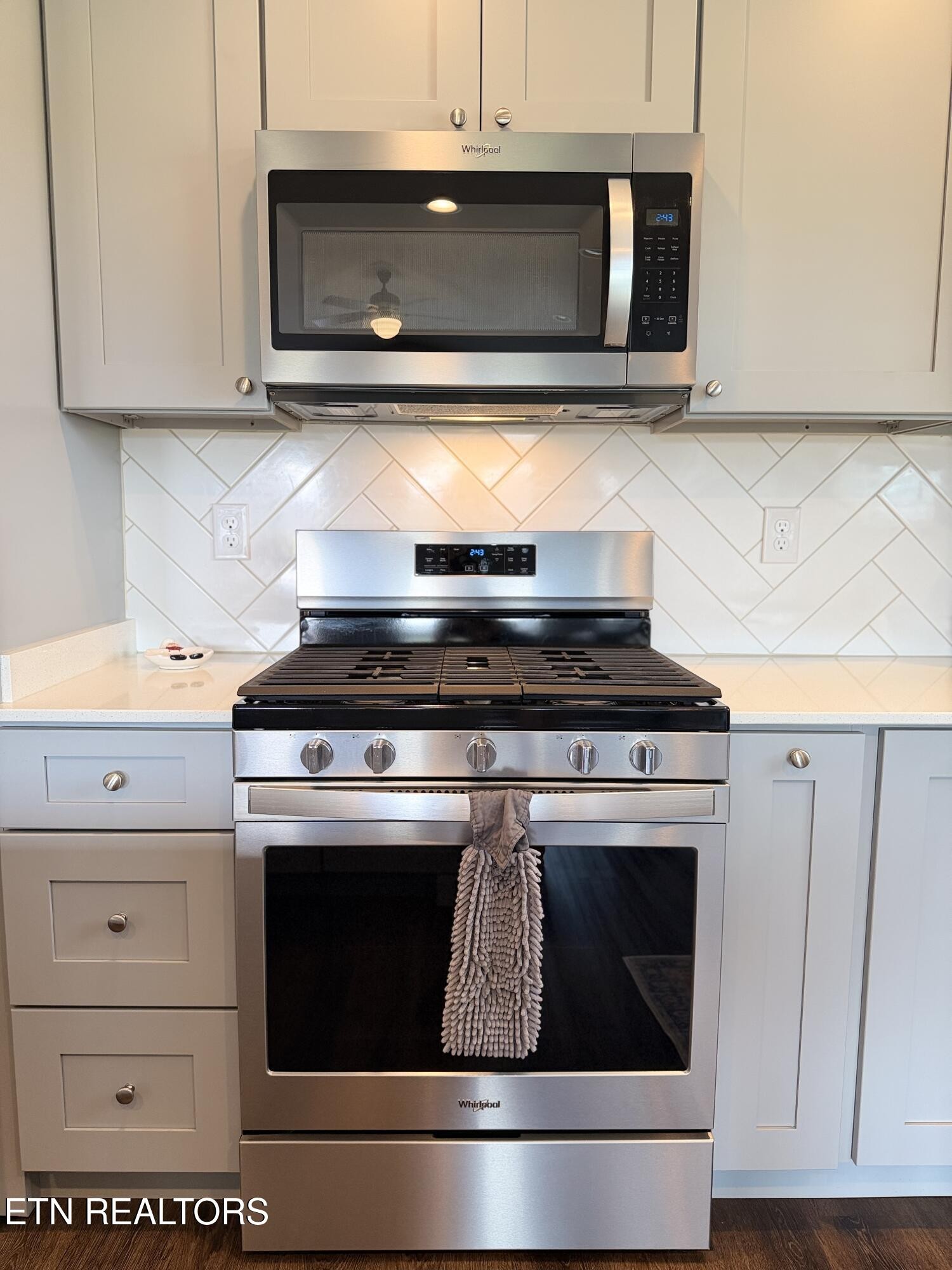 1021 Pleasant Grove Road Winfield, TN 37892 - Photo 27 of 42 a stove top oven sitting inside of a kitchen