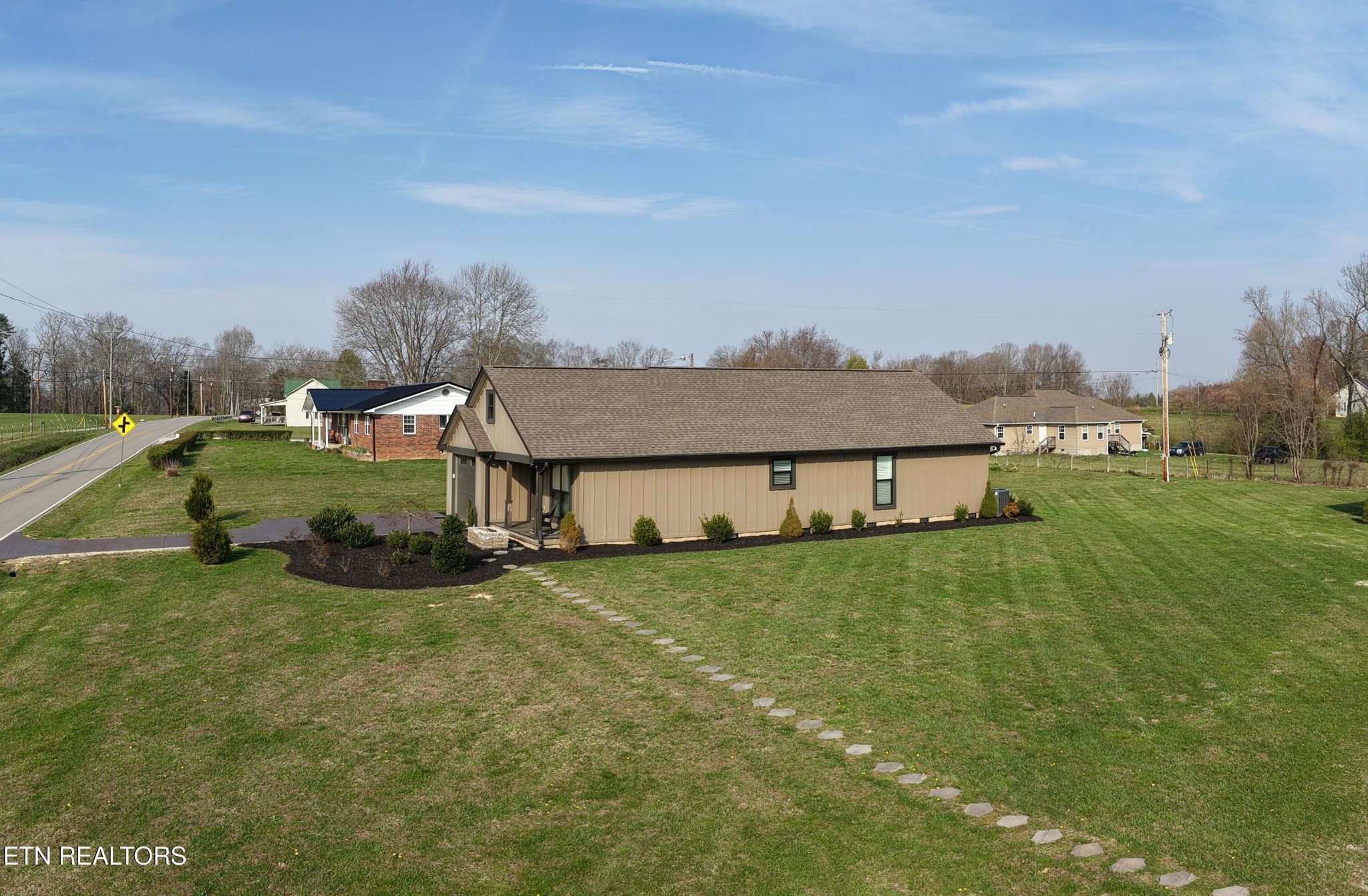 1021 Pleasant Grove Road Winfield, TN 37892 - Photo 6 of 42 a view of a house with a big yard and large tree