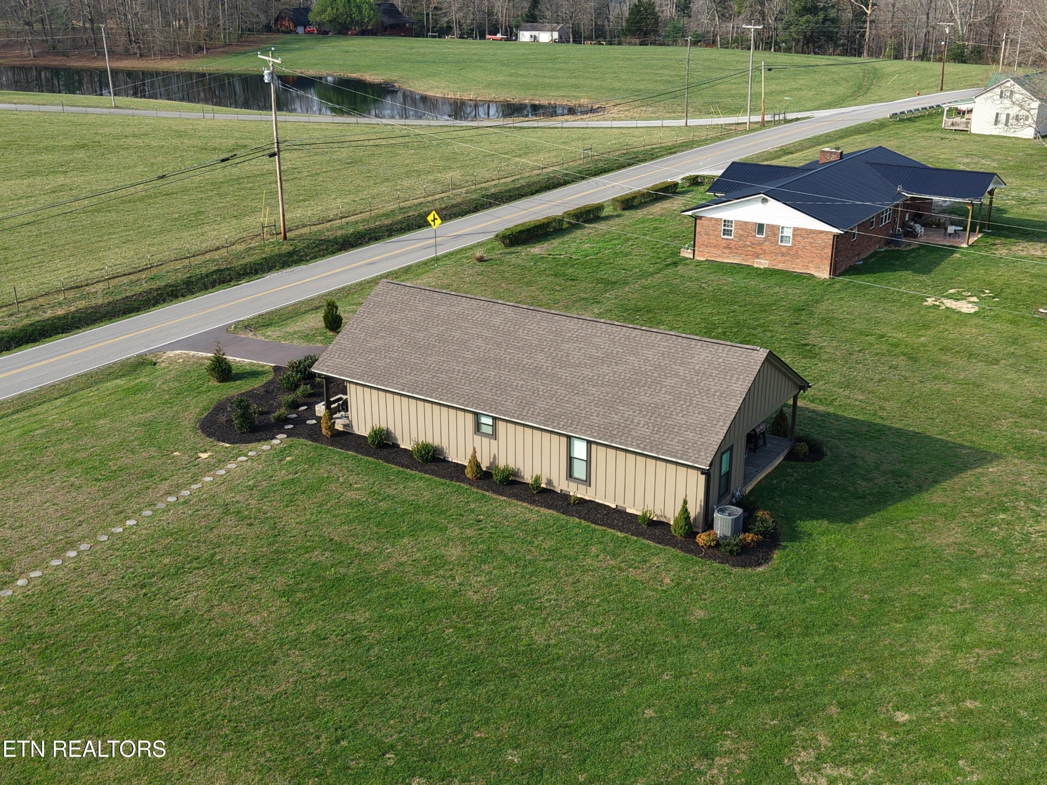 1021 Pleasant Grove Road Winfield, TN 37892 - Photo 10 of 42 a garden view with a sitting space