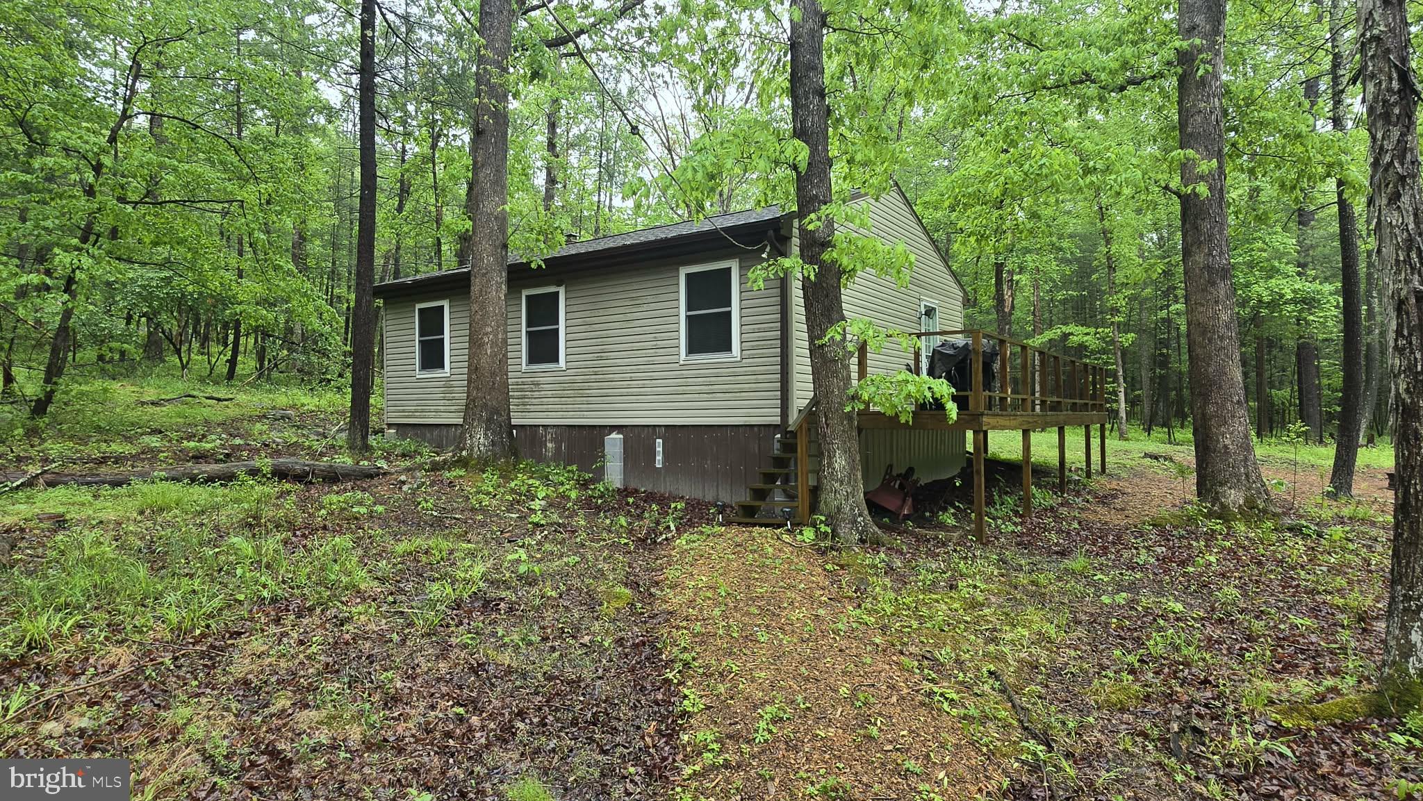 8245 Aughwick Road Fort Loudon, PA 17224 - Photo 5 of 26 a view of house with a backyard