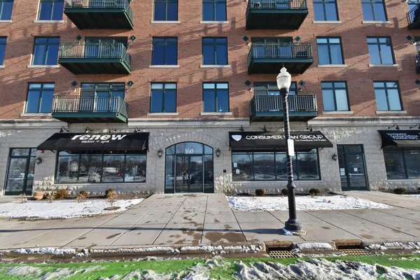 a front view of building with yard