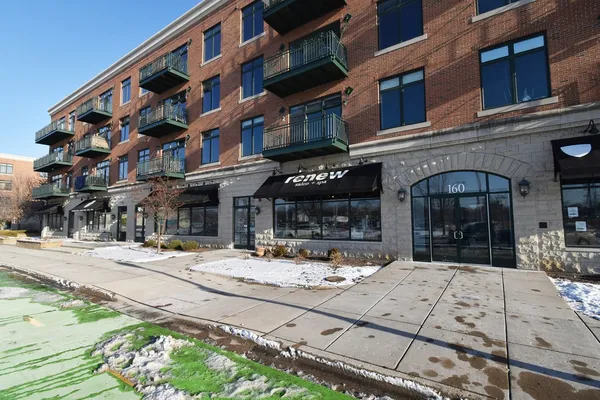 a street corner with retail shops