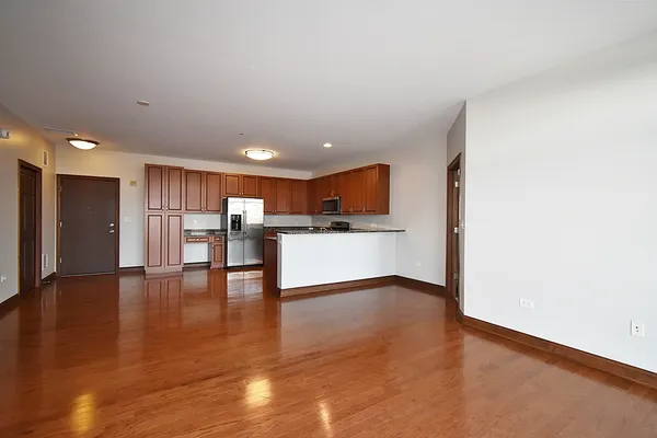 a view of kitchen with wooden floor