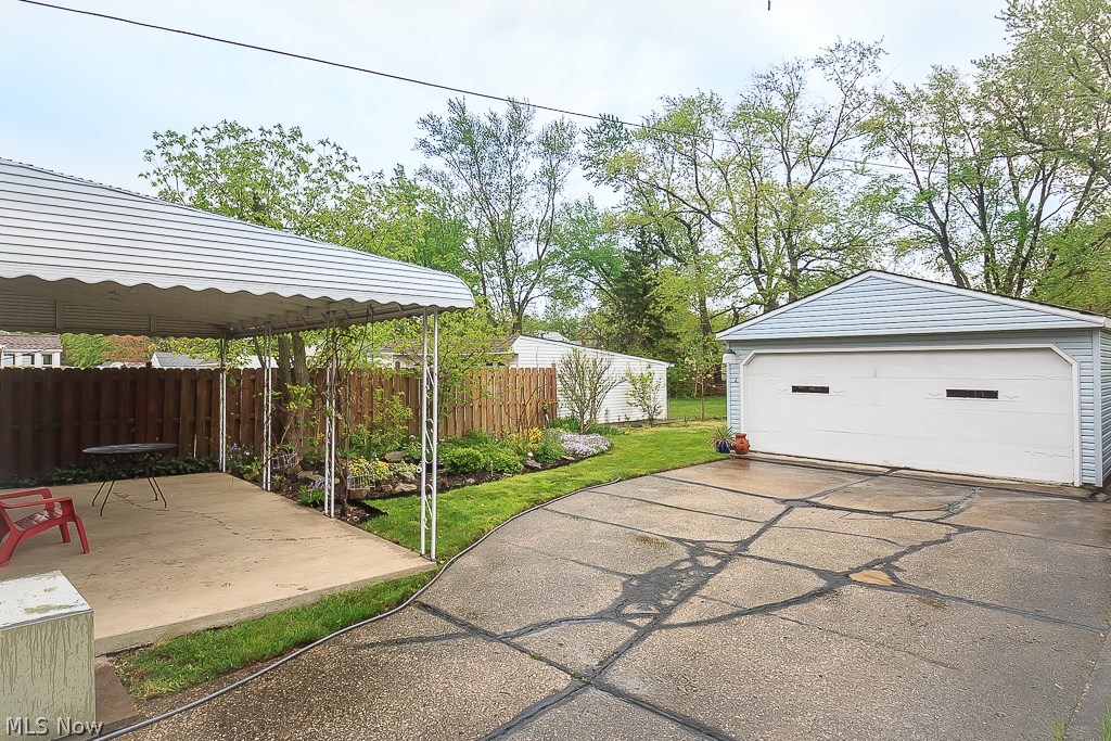 1271 Avondale Road Cleveland, OH 44121 - Photo 32 of 35 Covered patio, large backyard and oversized 2 car garage
