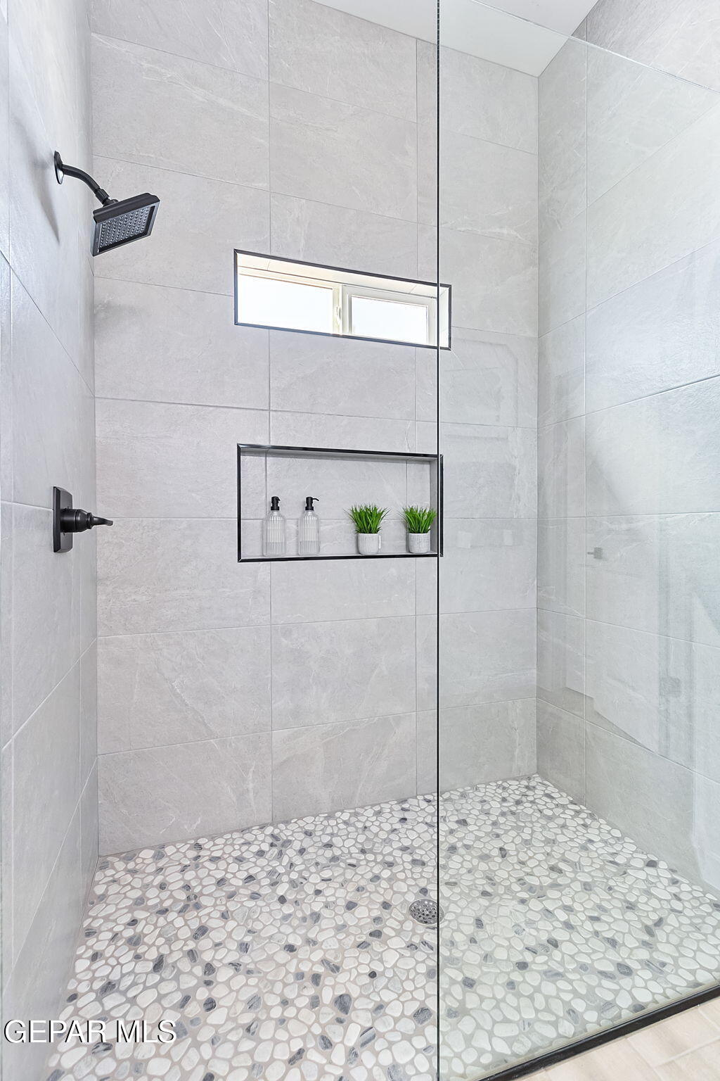 3861 Object Place El Paso, TX 79938 - Photo 4 of 17 a bathroom with a shower