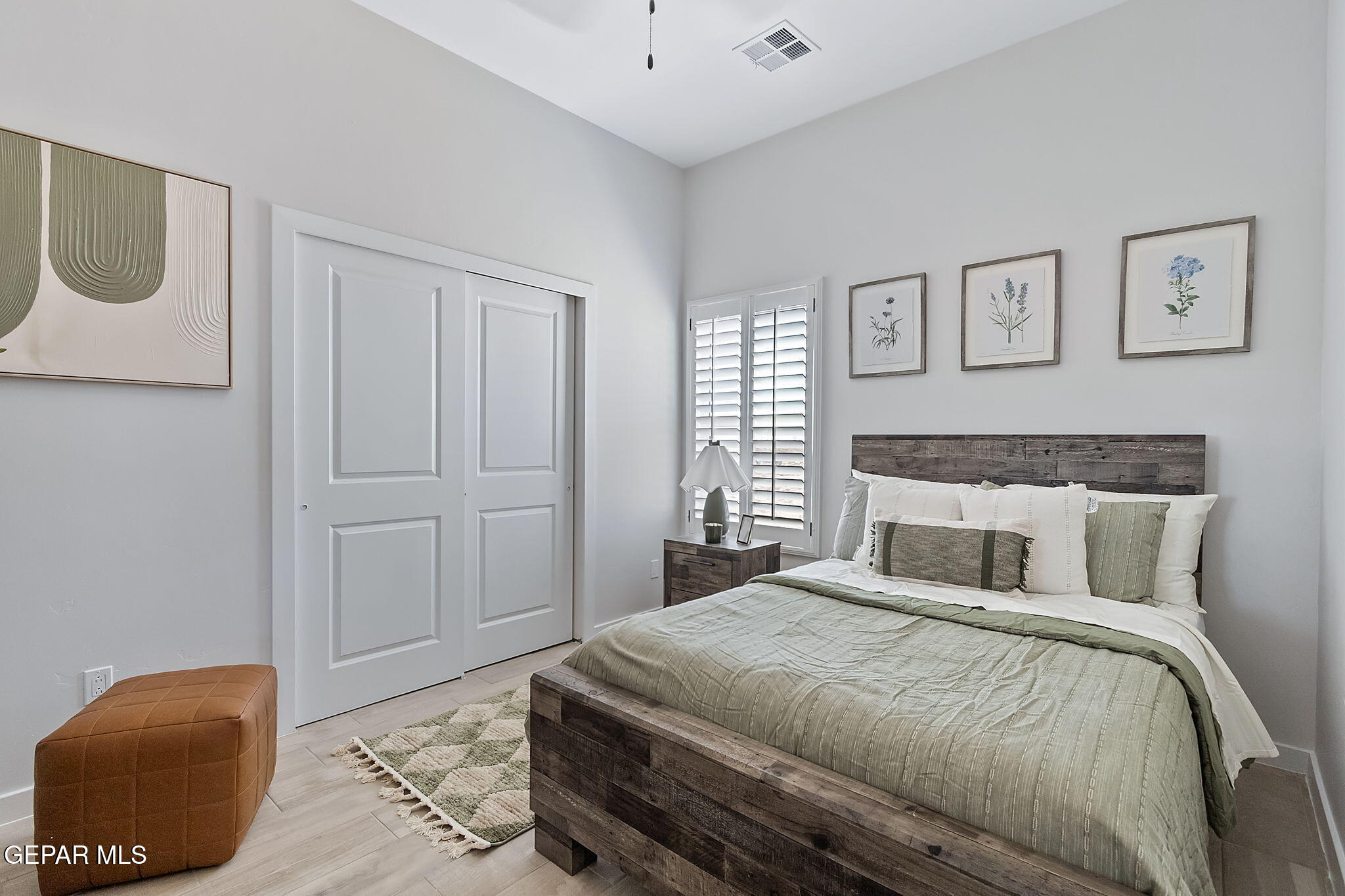 3861 Object Place El Paso, TX 79938 - Photo 6 of 17 a bedroom with a bed and a painting on the wall