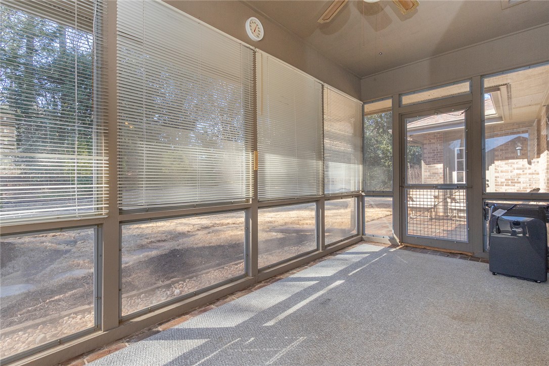 52 Hickory Way Clemson, SC 29631 - Photo 14 of 49 This sunroom offers an inviting space to relax, bringing the outdoors in with ample natural light.