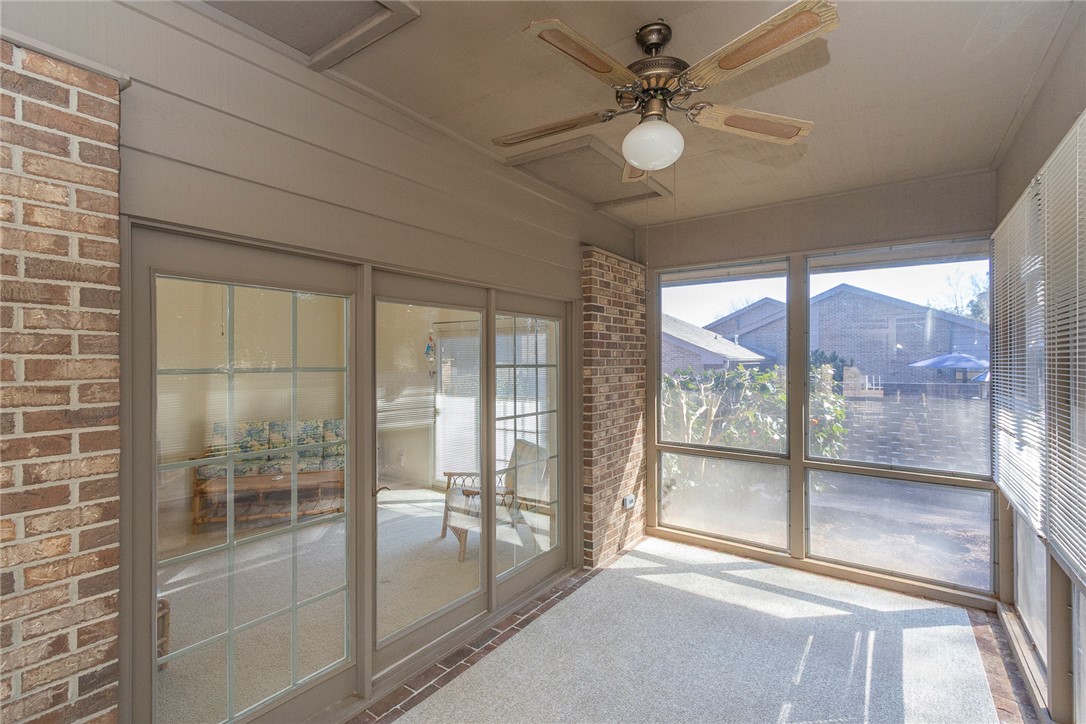 52 Hickory Way Clemson, SC 29631 - Photo 15 of 49 This bright sunroom offers a seamless connection to the outdoors, perfect for relaxation.