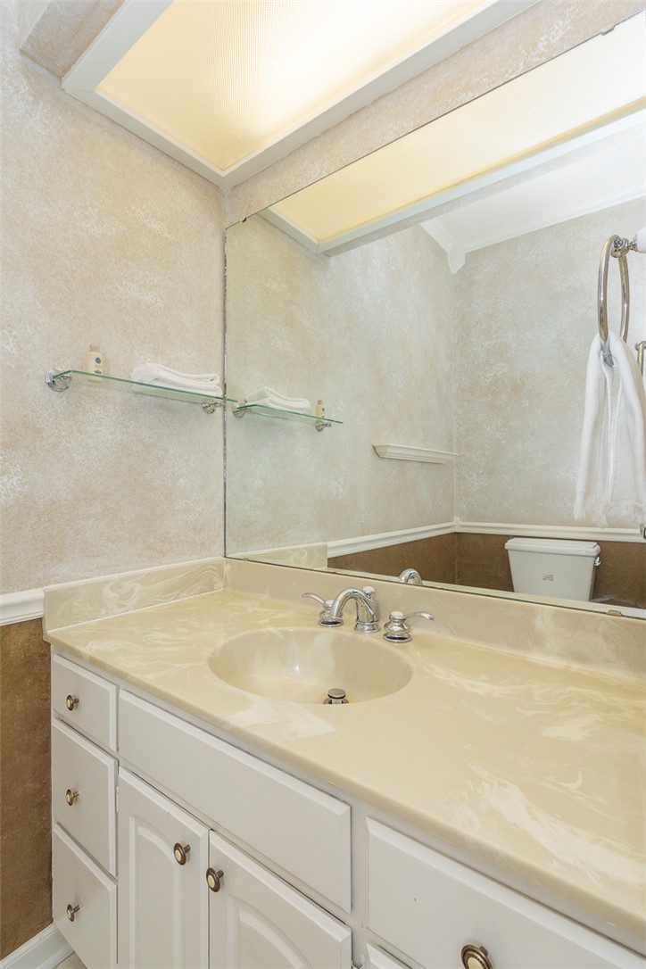 52 Hickory Way Clemson, SC 29631 - Photo 16 of 49 This bathroom features a sleek vanity and an expansive mirror.