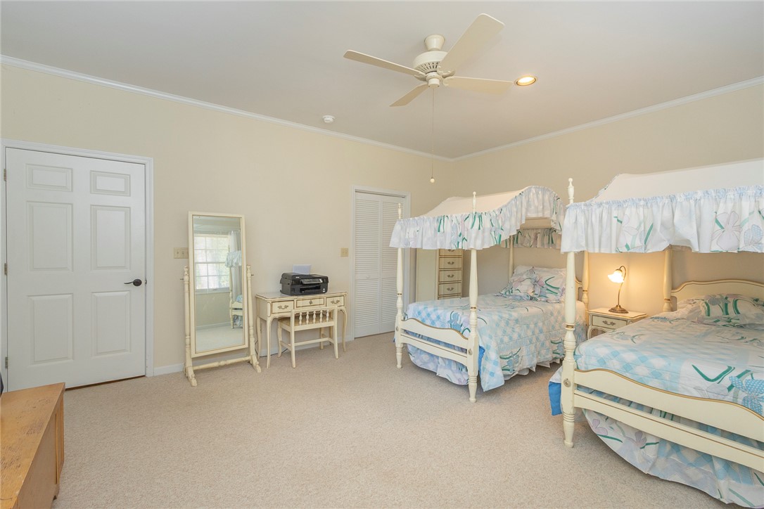 52 Hickory Way Clemson, SC 29631 - Photo 18 of 49 This spacious bedroom features comfortable carpet flooring and an overhead ceiling fan for optimal comfort.