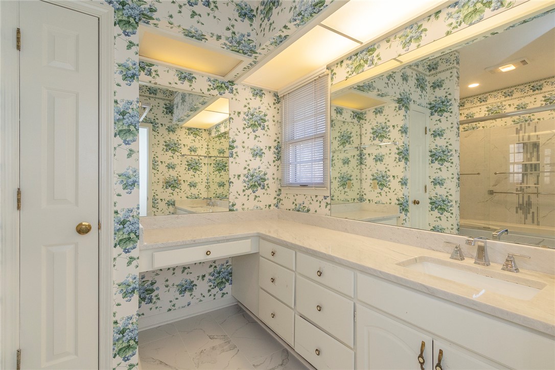 52 Hickory Way Clemson, SC 29631 - Photo 19 of 49 This primary bathroom features an expansive vanity and shower, creating a bright and airy retreat.