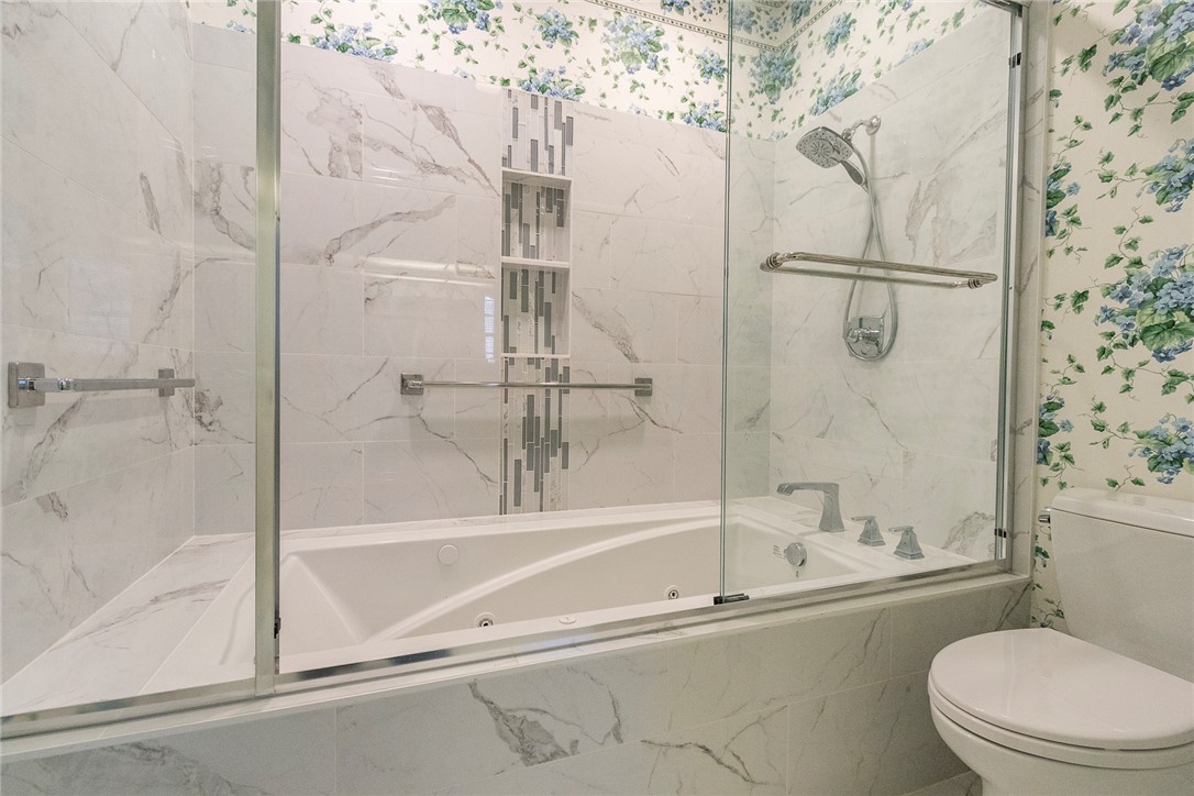 52 Hickory Way Clemson, SC 29631 - Photo 20 of 49 This bathroom features a contemporary shower and tub combination, perfect for unwinding after a long day.