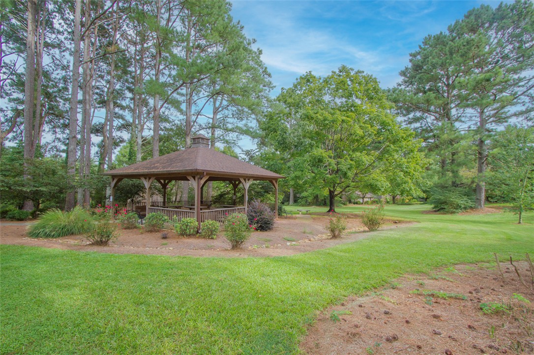 52 Hickory Way Clemson, SC 29631 - Photo 41 of 49 This tranquil outdoor space features a charming gazebo, perfect for relaxation and enjoying the natural surroundings.