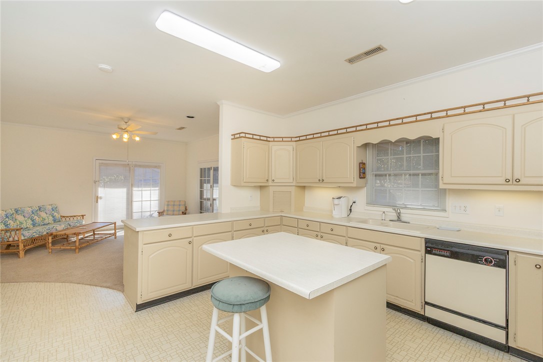 52 Hickory Way Clemson, SC 29631 - Photo 7 of 49 This spacious kitchen offers functional design and ample counter space for everyday living.