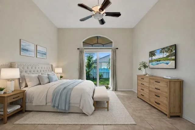 a large kitchen with a lot of cabinets and stainless steel appliances