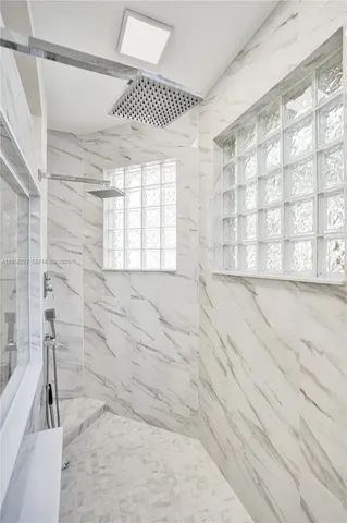 a kitchen with a sink a stove and refrigerator