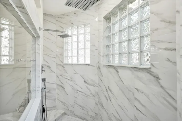 a kitchen with a refrigerator sink and microwave