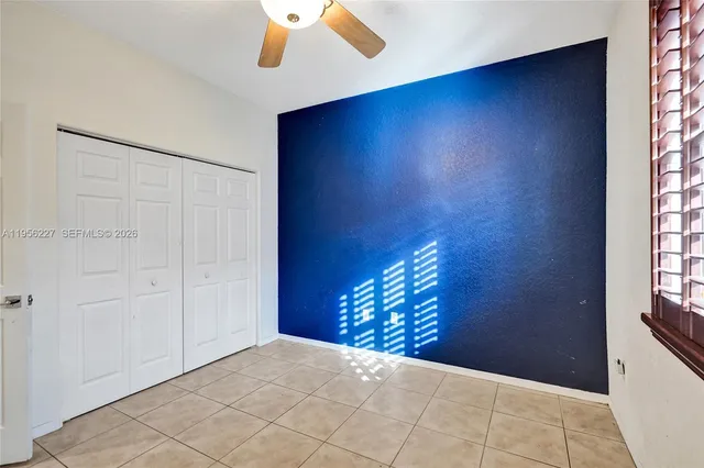 a view of a park with palm trees