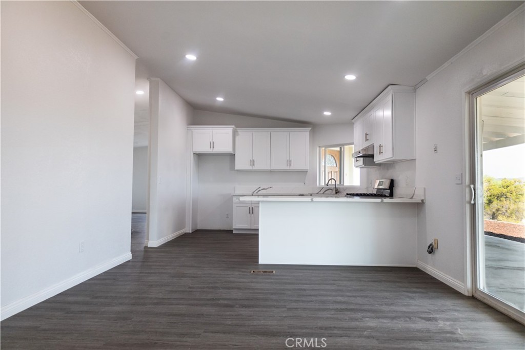 56515 Dickson Way Anza, CA 92539 - Photo 6 of 17 a view of kitchen with wooden floor