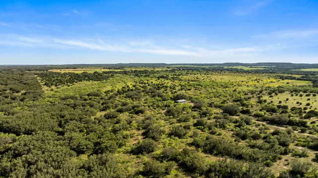 a view of a yard with an outdoor space