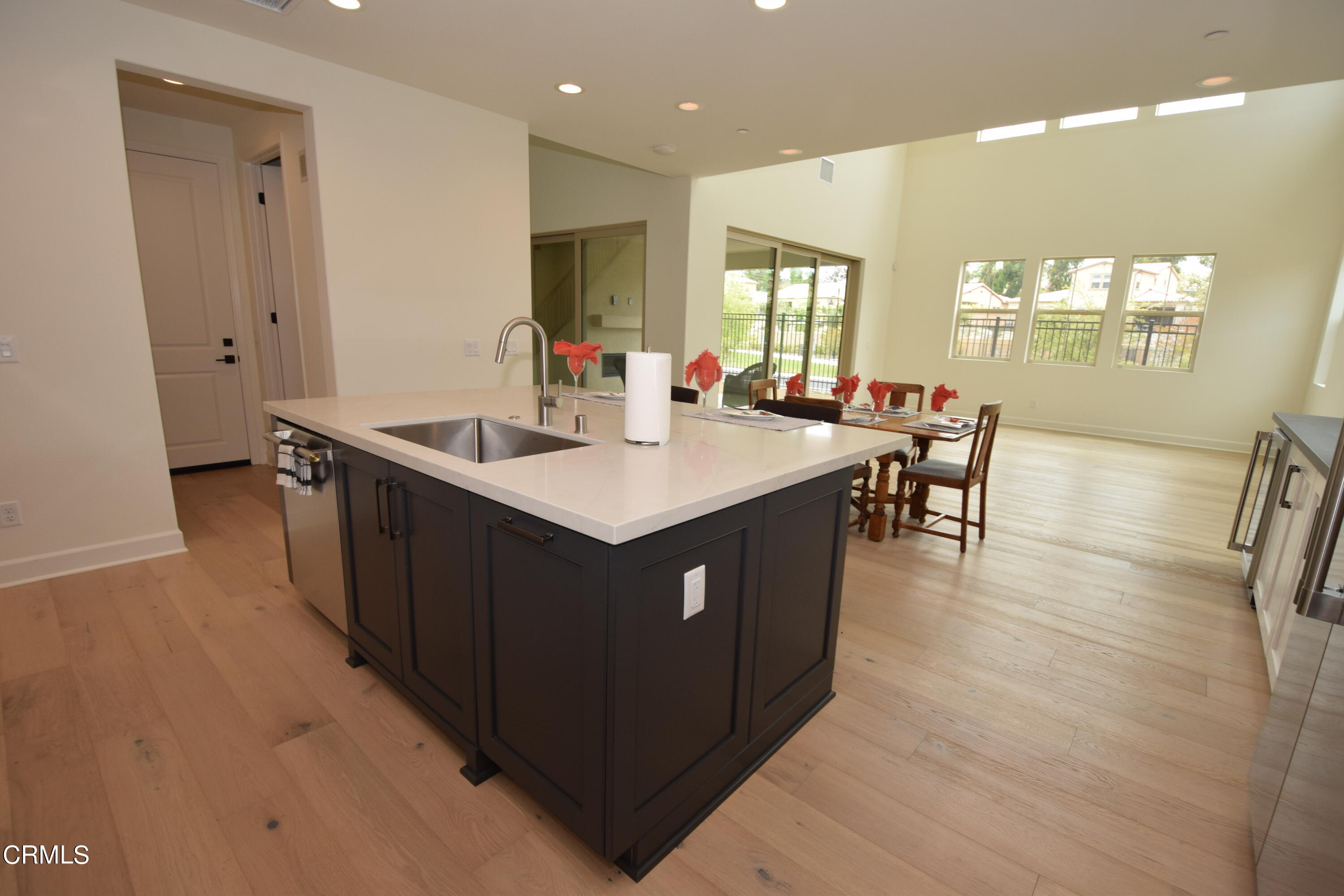 2480 Rondell Road Camarillo, CA 93012 - Photo 20 of 52 a kitchen with kitchen island granite countertop a sink a counter top space and stainless steel appliances