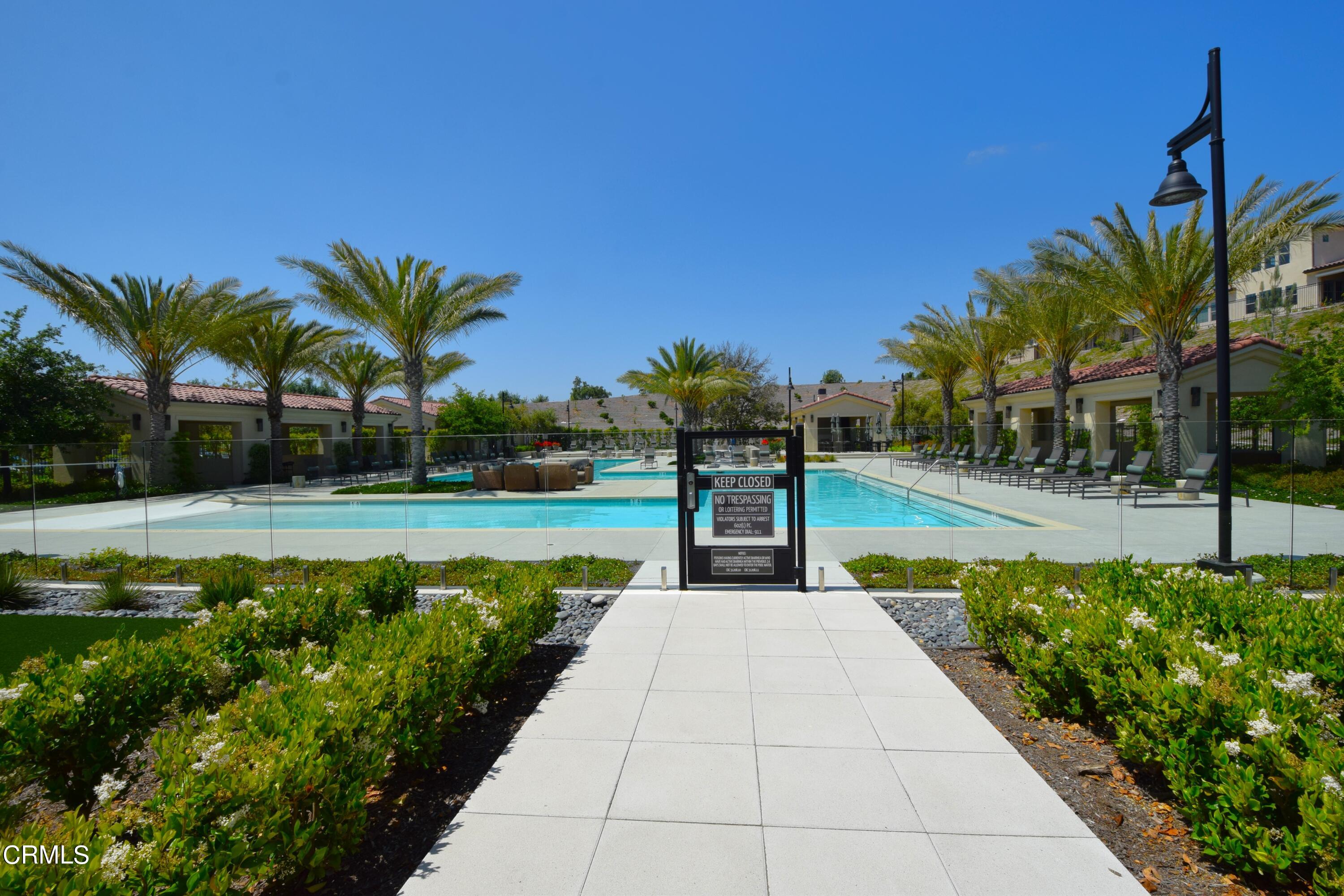 2480 Rondell Road Camarillo, CA 93012 - Photo 41 of 52 a swimming pool with outdoor seating and garden