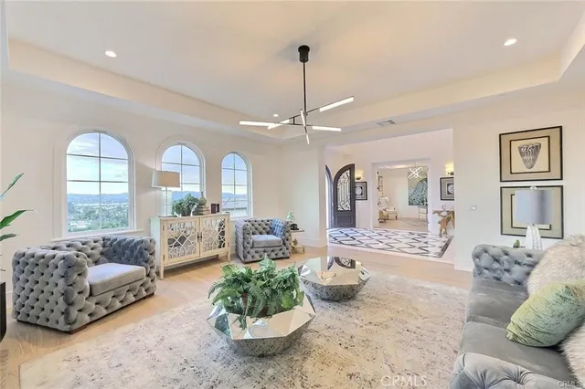 a kitchen with stainless steel appliances kitchen island granite countertop a sink and cabinets