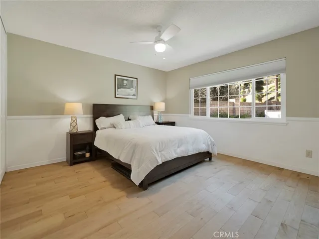 a bathroom with a sink double vanity granite and a mirror