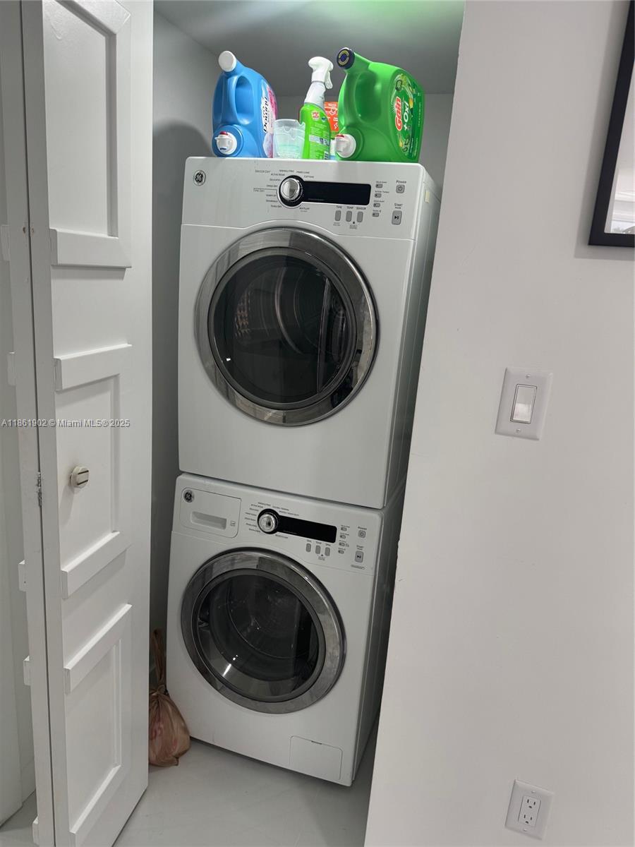 6423 Collins Avenue, Unit 401 Miami Beach, FL 33141 - Photo 12 of 17 a utility room with dryer and washer