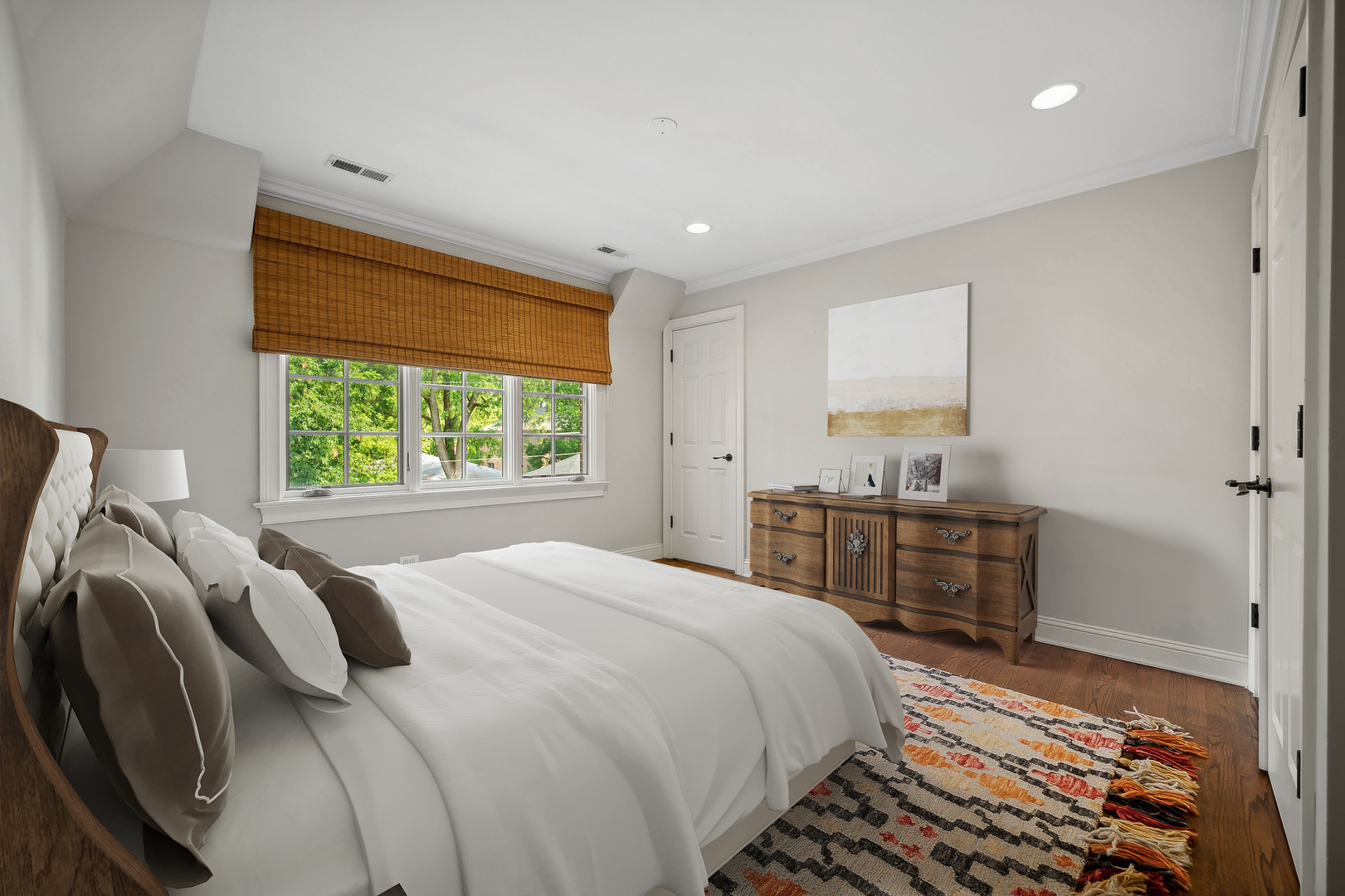 719 Forest Road Glenview, IL 60025 - Photo 23 of 38 a bedroom with a bed and a window