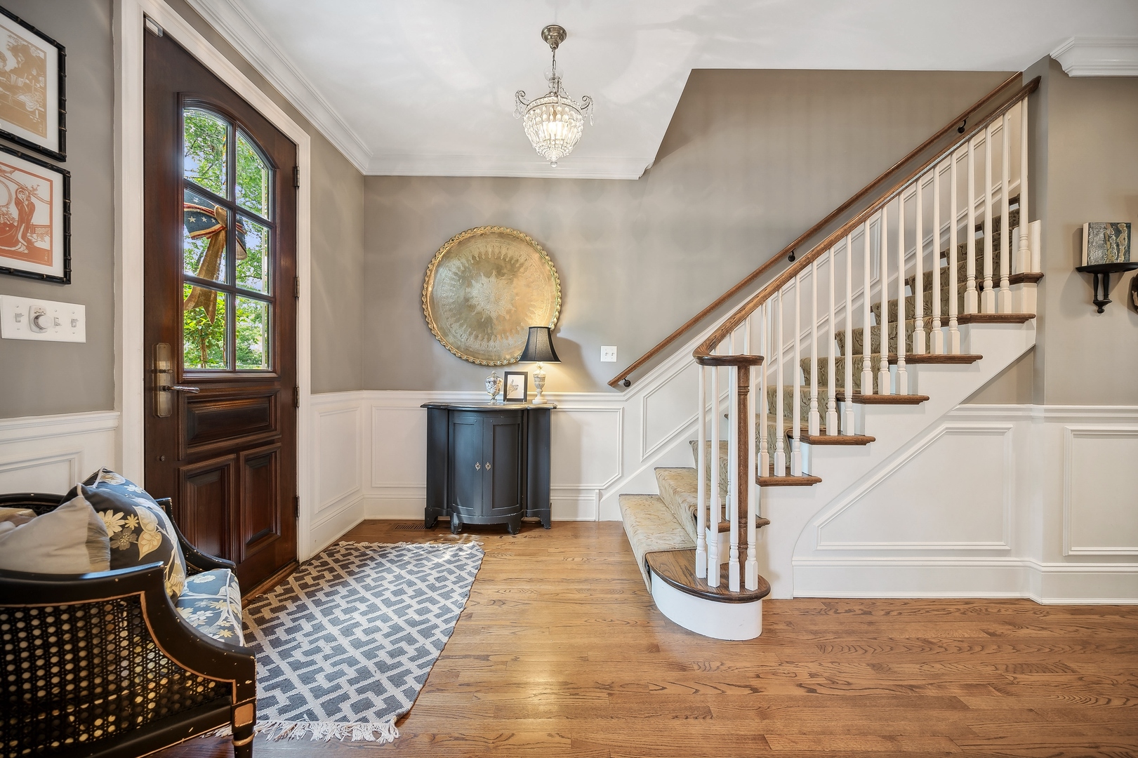 719 Forest Road Glenview, IL 60025 - Photo 3 of 38 a view of entryway and hall with wooden floor