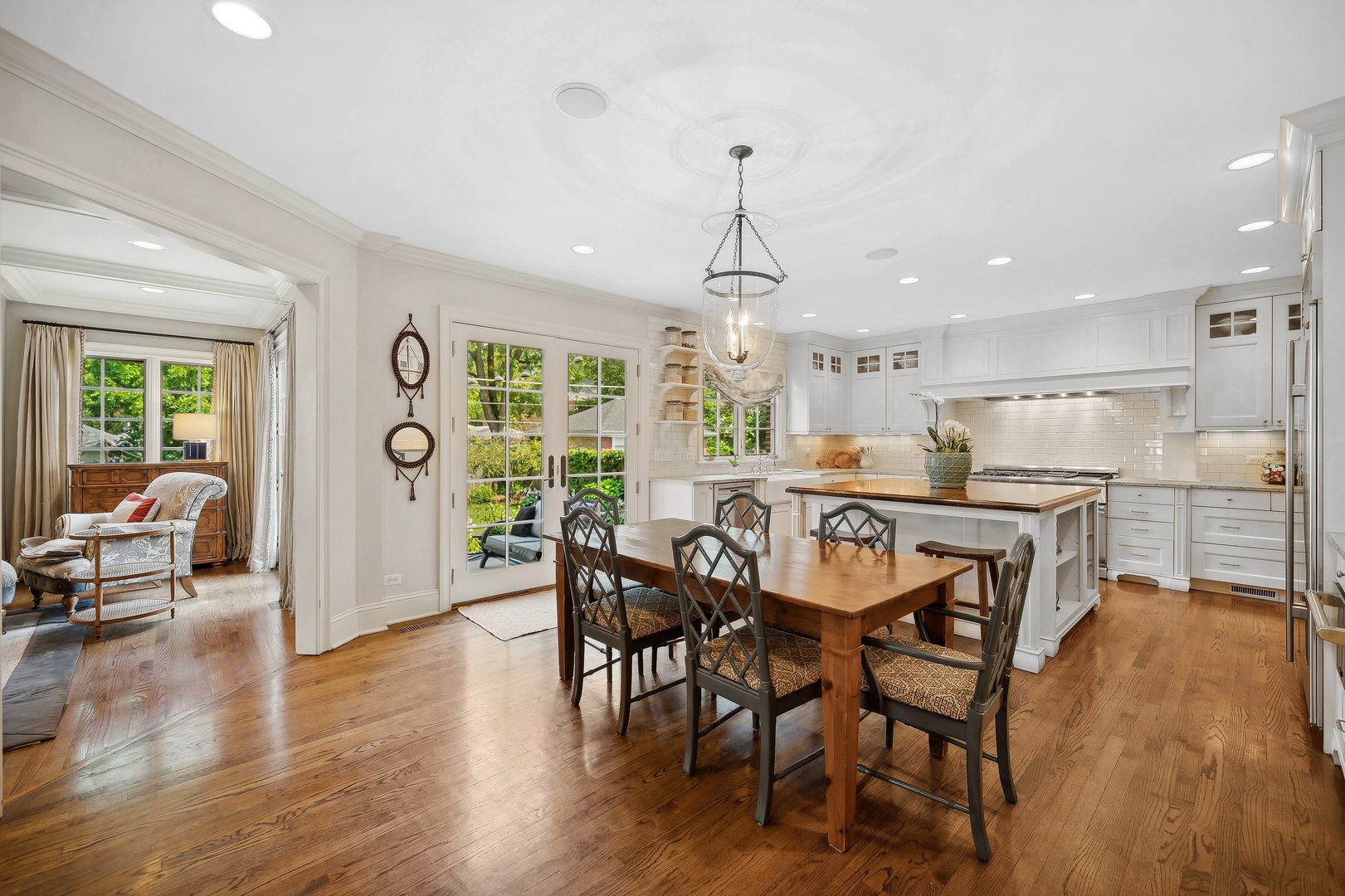 719 Forest Road Glenview, IL 60025 - Photo 7 of 38 a view of a dining room with furniture window and wooden floor