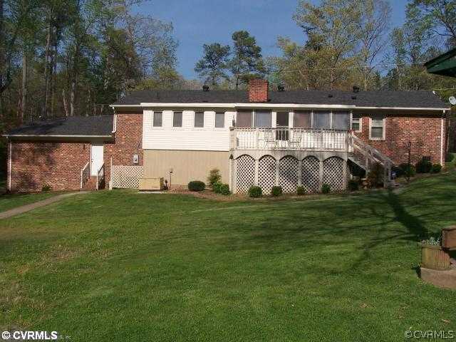4135 Quinton Road Quinton, VA 23141 - Photo 2 of 10 Exterior Back - Large sun room opens up to huge de
