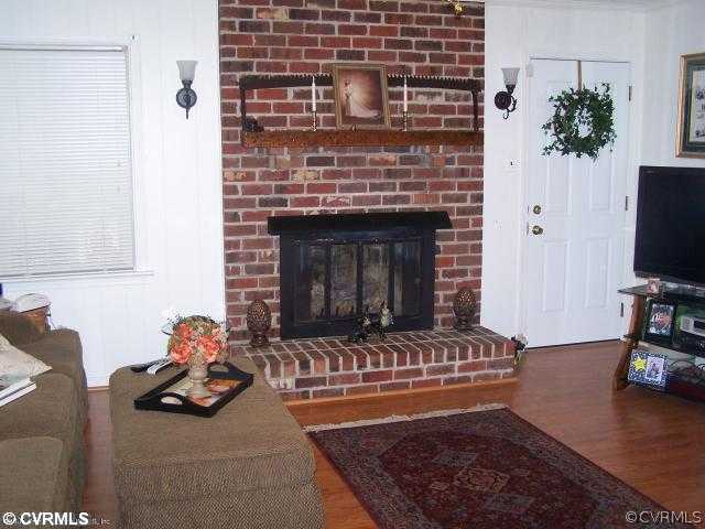 4135 Quinton Road Quinton, VA 23141 - Photo 5 of 10 Den/Family/Great Room - Real full brick fireplace