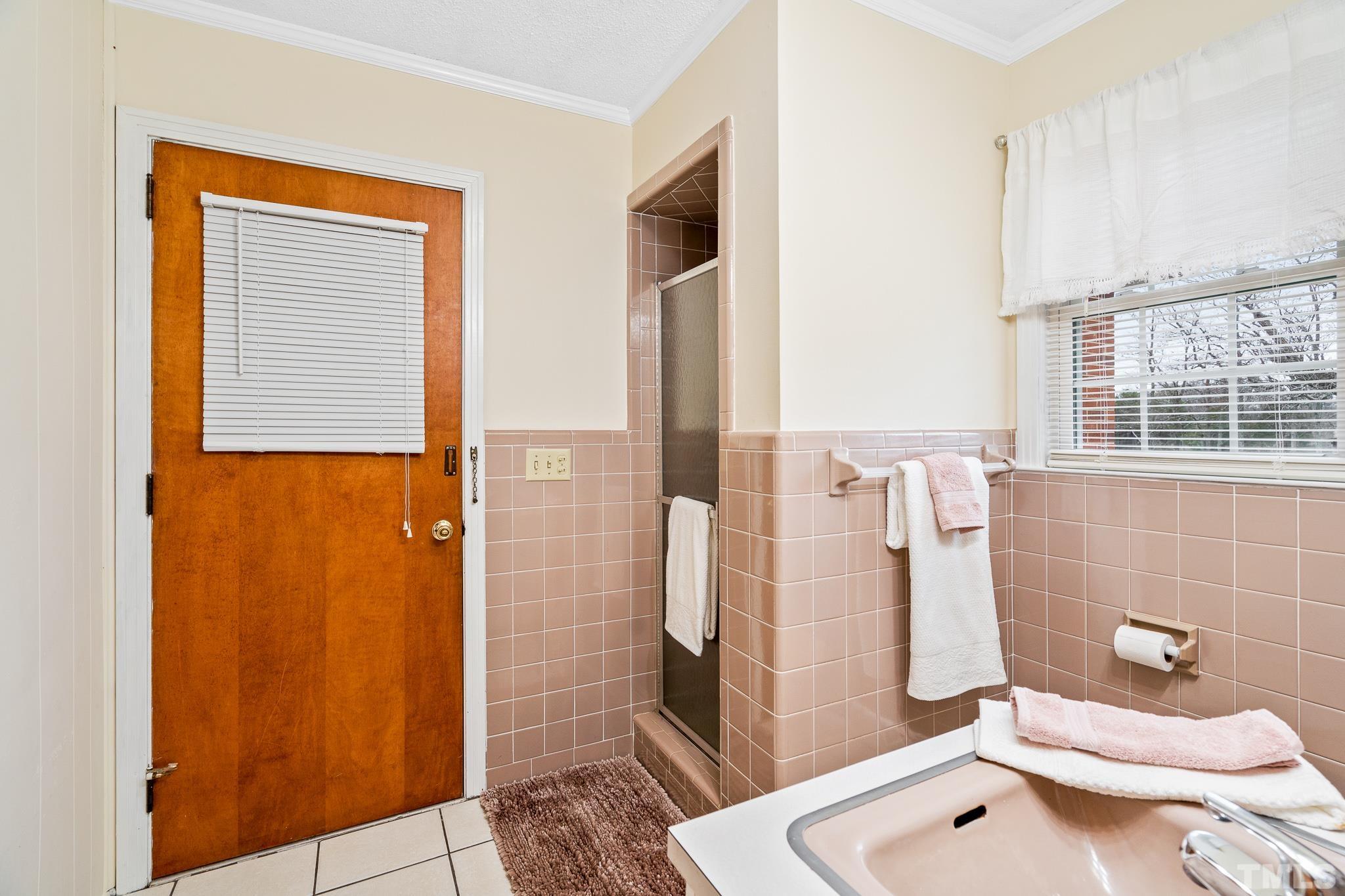 7630 High Rock Road Efland, NC 27243 - Photo 18 of 25 a bathroom with a sink and toilet