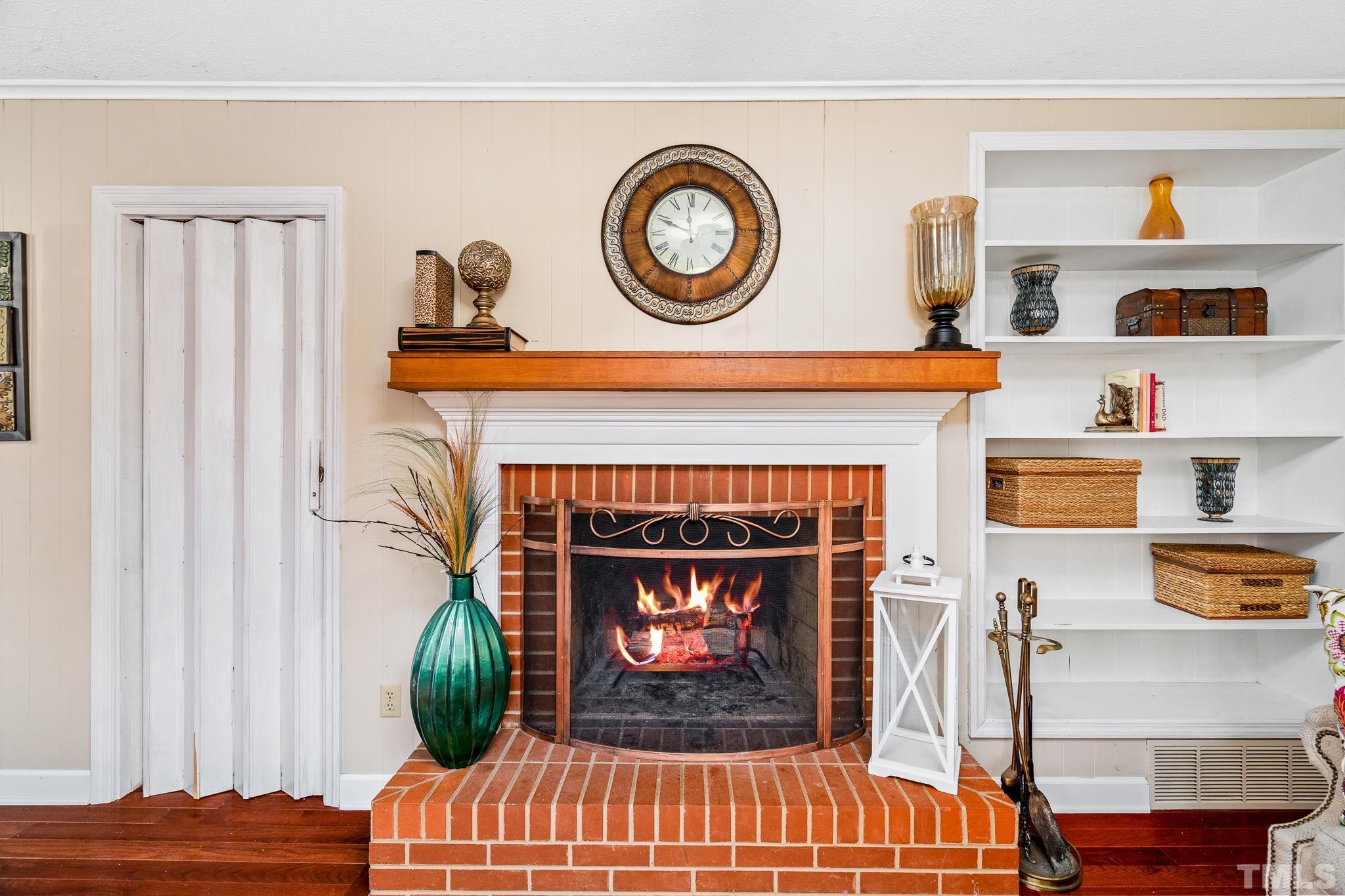 7630 High Rock Road Efland, NC 27243 - Photo 5 of 25 a living room with furniture and a fireplace