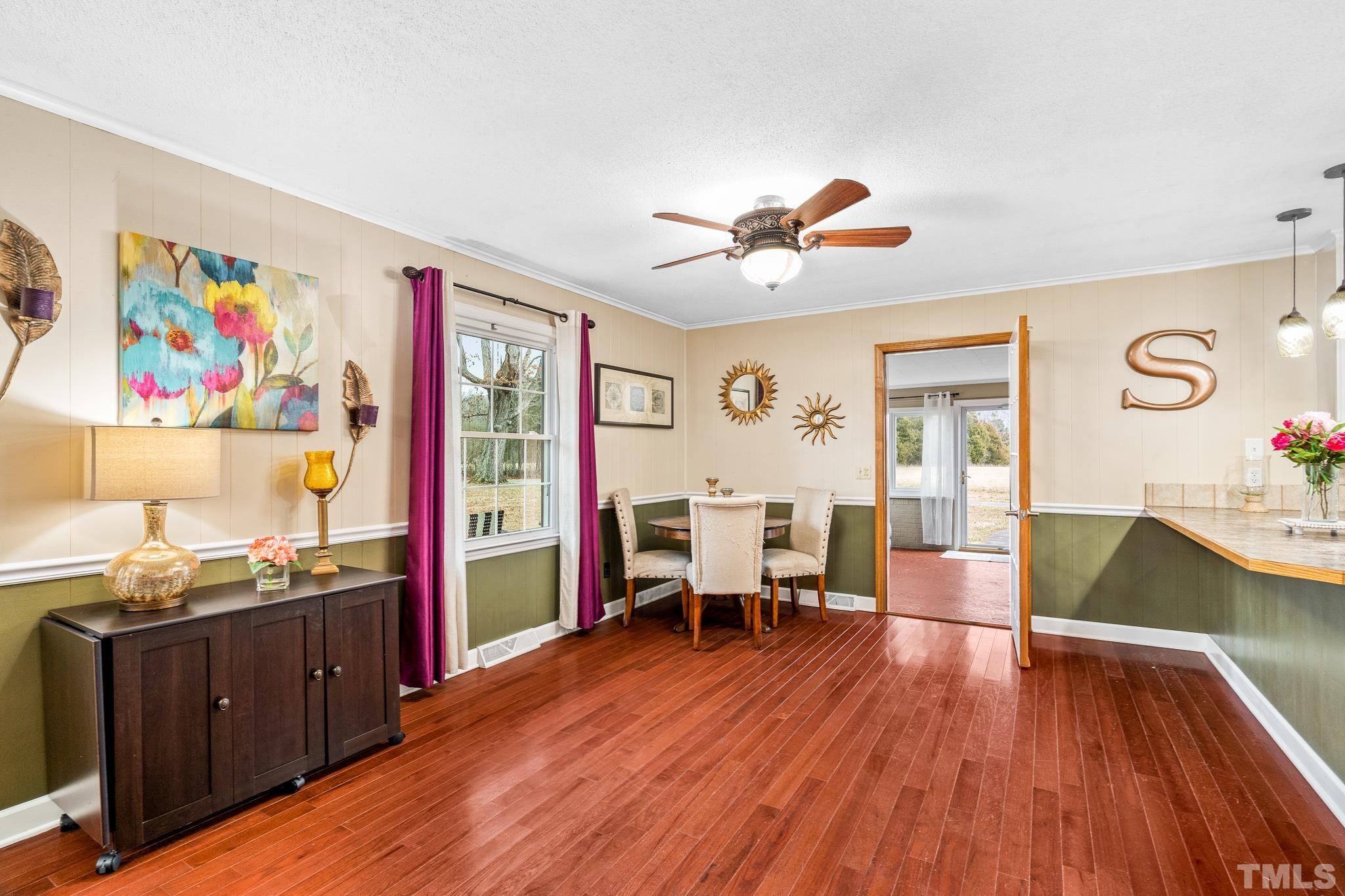7630 High Rock Road Efland, NC 27243 - Photo 6 of 25 a view of a workspace with furniture and wooden floor