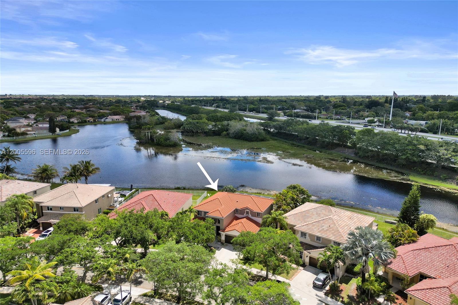 4281 Laurel Ridge Circle Weston, FL 33331 - Photo 8 of 80 an aerial view of a house with a lake view