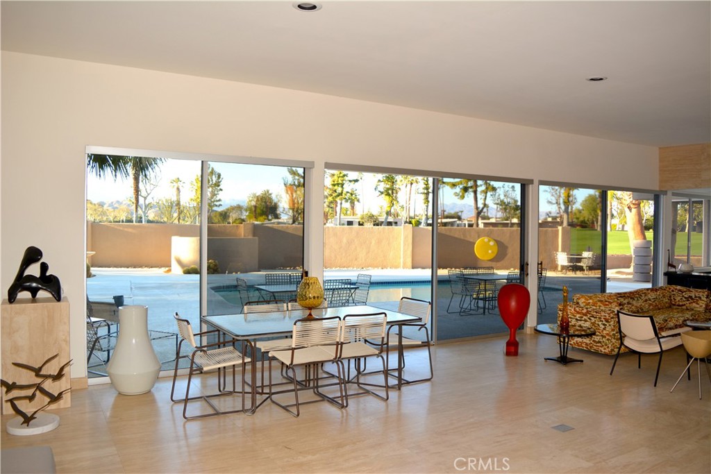40231 Club View Drive Rancho Mirage, CA 92270 - Photo 5 of 37 a living room with furniture and a large window